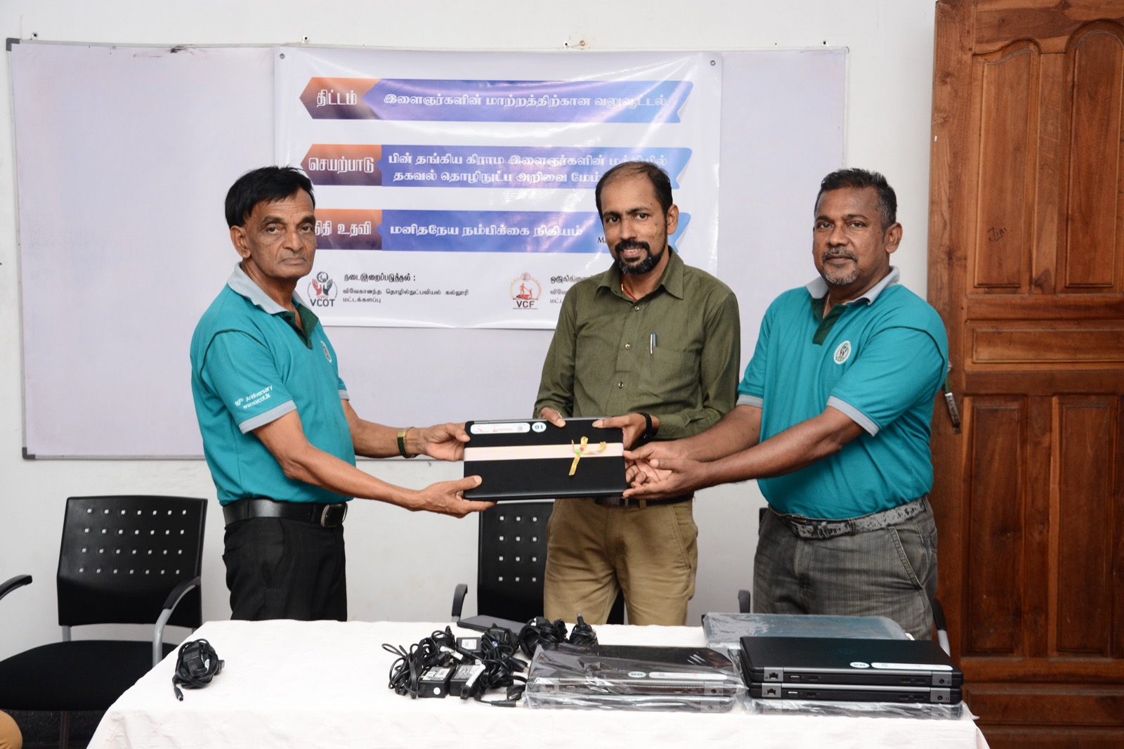 Handover the Laptops to VCOT for initiative of Community College Concept